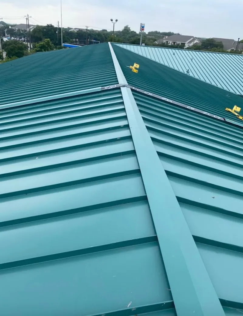 Green commercial metal roof ridge and valley for Metal Roof Repair in Hubbard