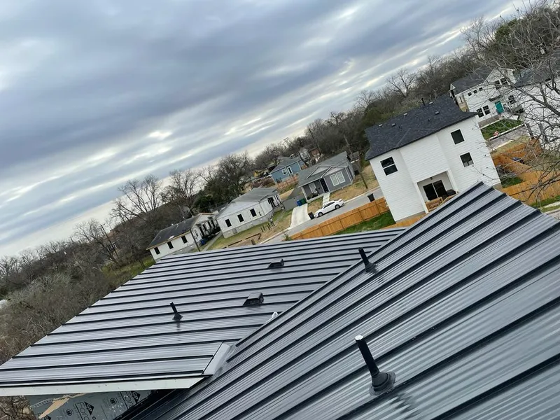 Standing seam metal roof panels with vents for Skylight Repair in Hubbard